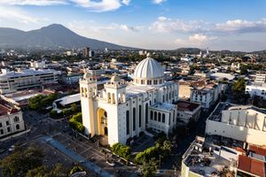 Stunning aerial view of San Salvador Cathedral with cityscape in the background.